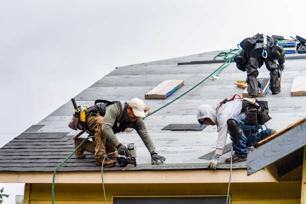 Professional Roofing technician working in Karthaus, PA